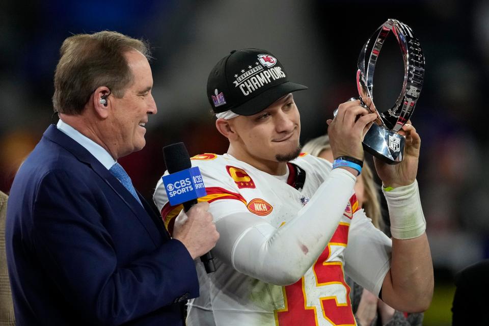 Kansas City Chiefs quarterback Patrick Mahomes (15) holds up the Lamar Hunt Trophy after the AFC Championship NFL football game against the Baltimore Ravens, Sunday, Jan. 28, 2024, in Baltimore. The Chiefs won 17-10. (AP Photo/Nick Wass) ORG XMIT: =AFC409