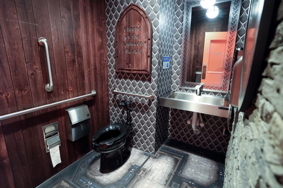 A medieval-themed restroom is shown at Raising Cane’s Restaurant, designed by Post Malone, in Midvale on Thursday, April 13, 2023. | Kristin Murphy, Deseret News