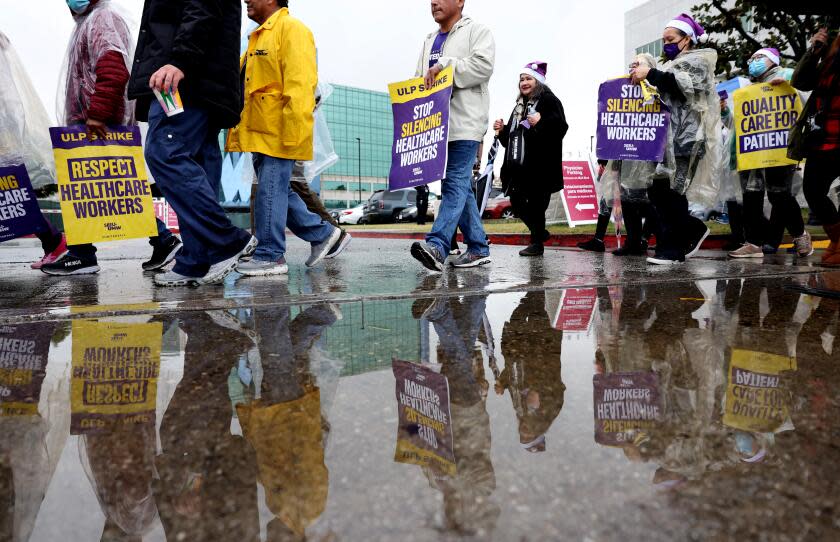 Lynwood, California December 20, 2023- Frontline healthcare workers picket outside St. Francis Medical Center in Lynwood Wednesday. (Wally Skalij/Los Angeles Times)