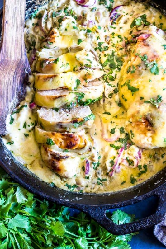 <p>Cast Iron Keto</p><p>This dish is packed with chiles, cheese, chicken, onions and spices for one delicious low-carb cheesy dinner!</p><p><strong>Get the recipe: <a href="https://www.castironketo.net/blog/keto-green-chile-chicken/" rel="nofollow noopener" target="_blank" data-ylk="slk:Keto Green Chile Chicken;elm:context_link;itc:0;sec:content-canvas" class="link ">Keto Green Chile Chicken</a></strong></p>