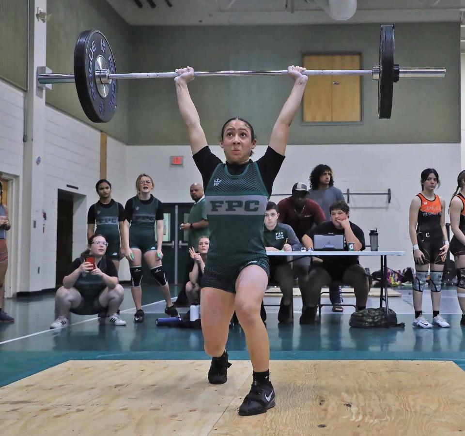 Nya Williams was one of three Flagler Palm Coast weightlifters to win both Olympic and traditional events at the District 4-3A meet.