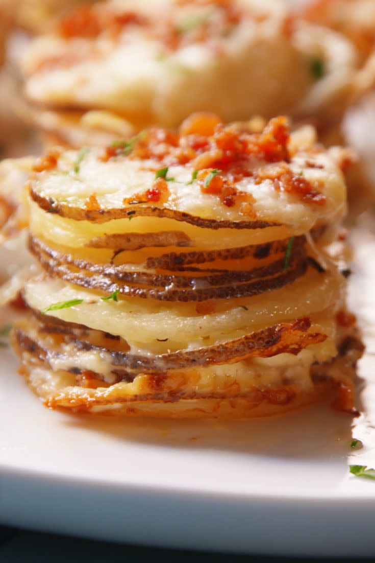 <p>These cute apps seriously class up the classic casserole.</p><p>Get the recipe from <a href="https://www.delish.com/cooking/recipe-ideas/recipes/a49447/potato-gratin-stacks-recipe/" rel="nofollow noopener" target="_blank" data-ylk="slk:Delish;elm:context_link;itc:0;sec:content-canvas" class="link ">Delish</a>.</p>