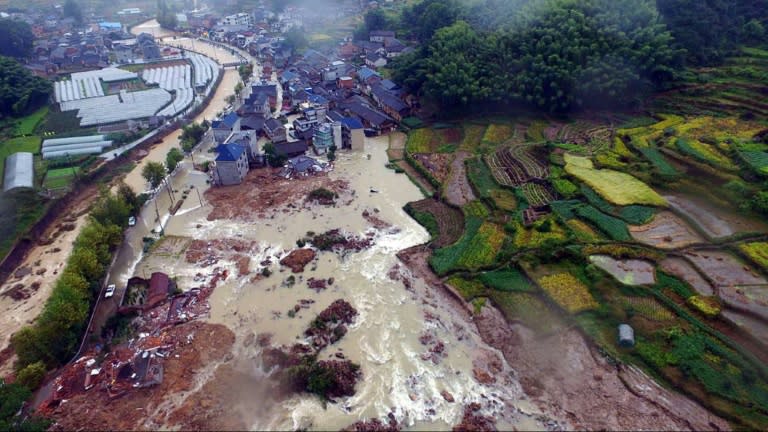 Aerial photo taken on September 29, 2016 shows landslide damage in the village of Sucun in Suichang county, in east China's Zhejiang province