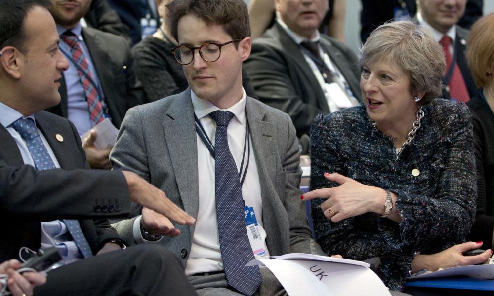 Leo Varadkar, left, speaks with the British prime minister, Theresa May