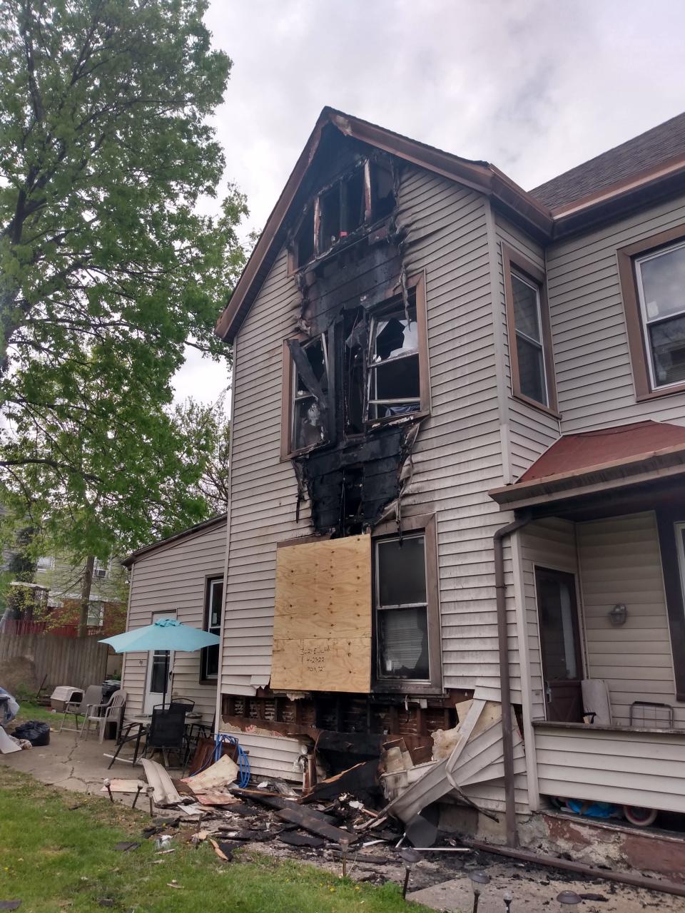 The fire damage to the Cincinnati house where a woman, child and dog were rescued.