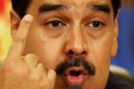 FILE PHOTO: Venezuela's President Nicolas Maduro talks to the media during a news conference at Miraflores Palace in Caracas, Venezuela October 17, 2017. REUTERS/Carlos Garcia Rawlins/File Photo