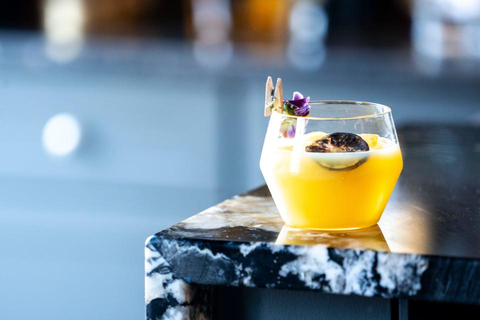 The Burnt Passion Fruit combines Casamigos mezcal and Bauchant orange liqueur at HoQtail cocktail lounge.