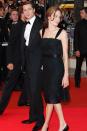 <p>Angelina Jolie looked demure in a black lace dress at the Cannes Film Festival with Brad Pitt. </p>