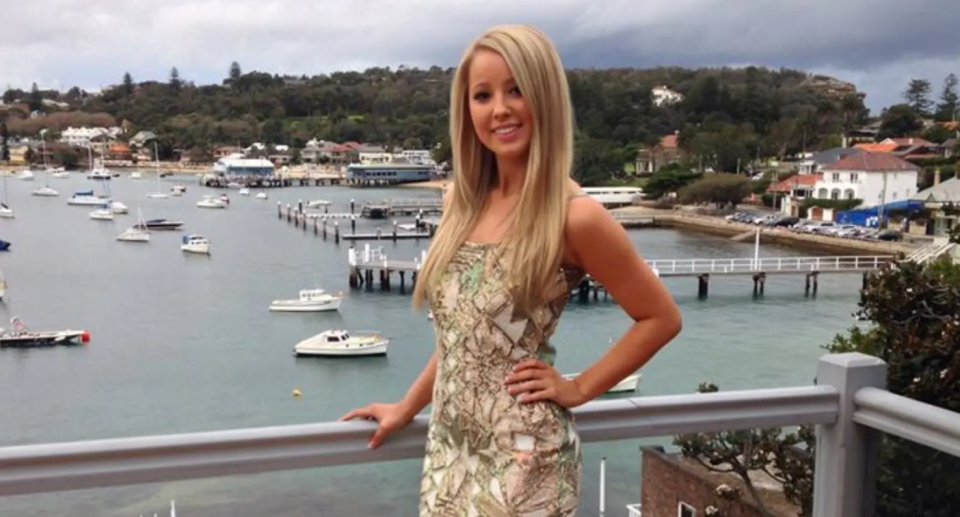 Dawn Singleton, daughter of Aussie businessman John, is pictured standing on a balcony. 
