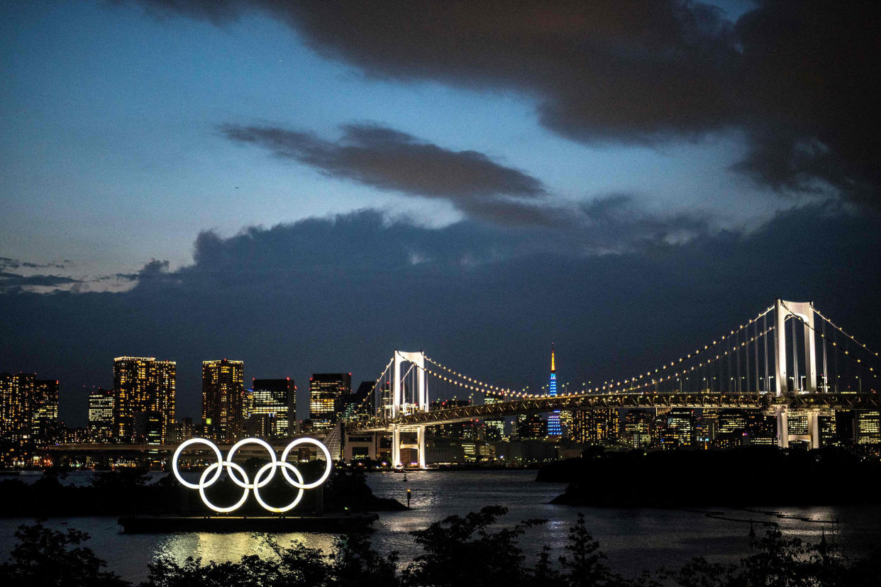 Image: The Olympic rings on Tokyo's Odaiba waterfront (Charly Triballeau / AFP - Getty Images)