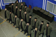 Trainees from Dewei Security attend a daily training session at a training camp, on the outskirts of Beijing, China March 2, 2017. REUTERS/Jason Lee