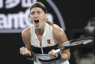 Petra Kvitova of the Czech Republic celebrates after winning the first set against United States' Danielle Collins during their semifinal at the Australian Open tennis championships in Melbourne, Australia, Thursday, Jan. 24, 2019. (AP Photo/Kin Cheung)