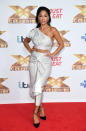 The talent show judge wears a matching one-shoulder dress and pencil skirt. <em>[Photo: Getty]</em>