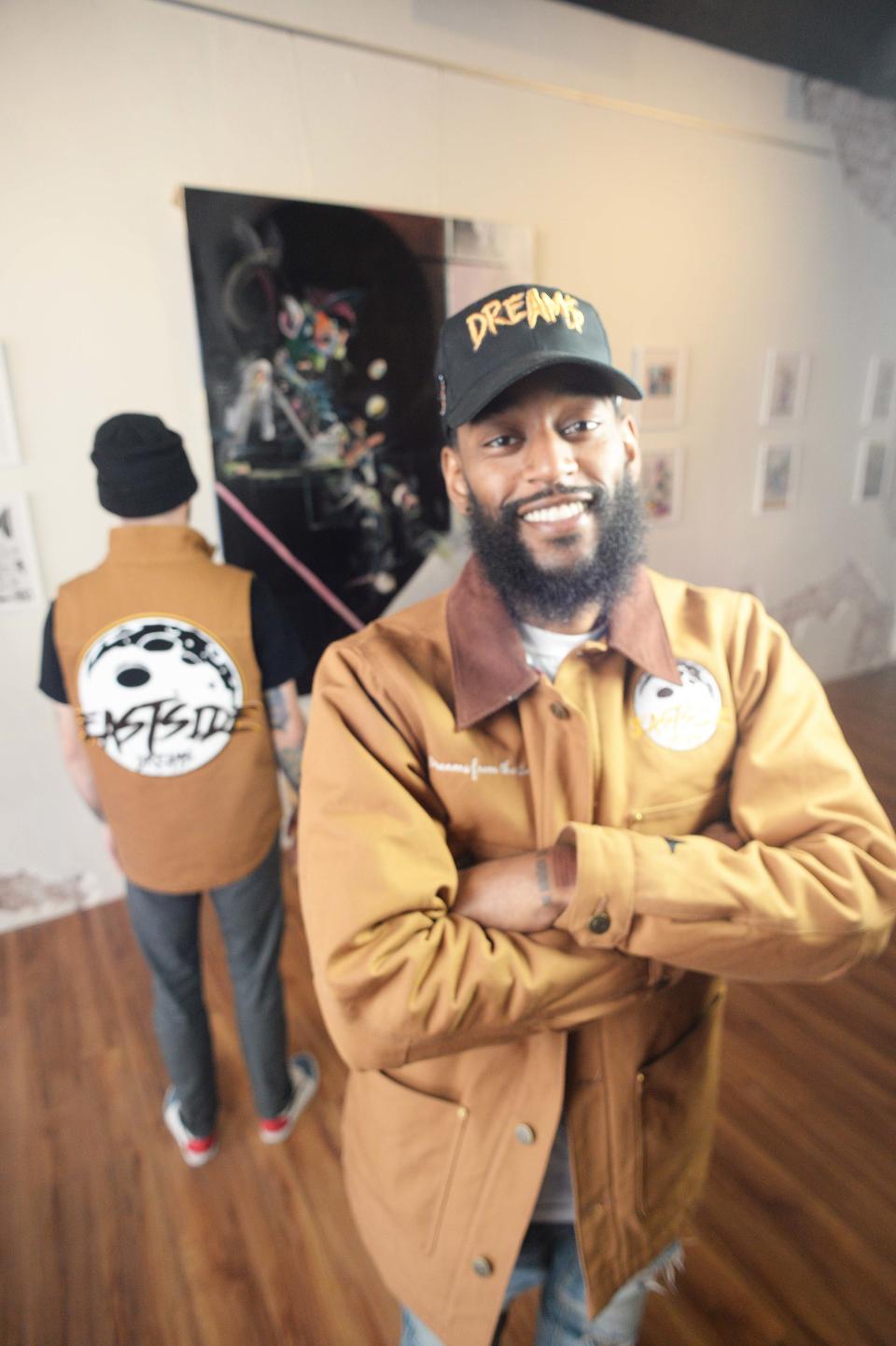 Freddie Mendes of Brockton, founder of Dreams from the East, a streetwear company, stops by his friend Ryan Jones’ tattoo studio, Real Art Studios, at 31MainSt. In Taunton April  29, 2022. From left, Jones and Mendes.