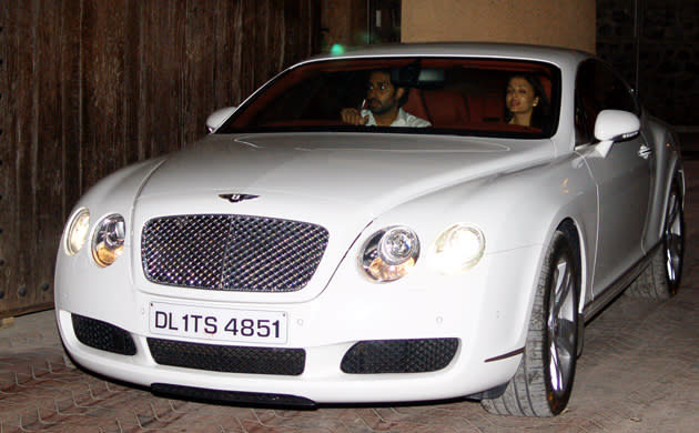 Abhishek and Aishwarya - in a car that fits their style