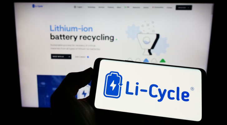 Person holding cellphone with logo of battery recycling company Li-Cycle Corp.(LICY) on screen in front of business webpage. Focus on phone display. Unmodified photo. EV stocks