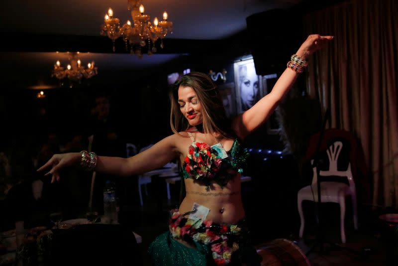 Mikaeil Alizadeh, also known by her stage name Leo, performs at a restaurant in Istanbul