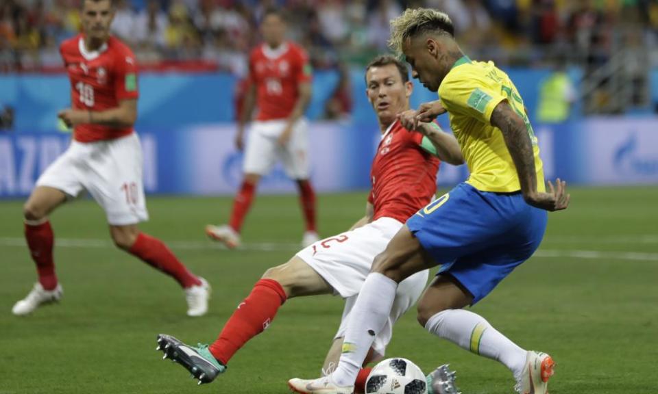 Stephan Lichtsteiner challenges Neymar during Switzerland’s 1-1 draw with Brazil in Rostov on Sunday