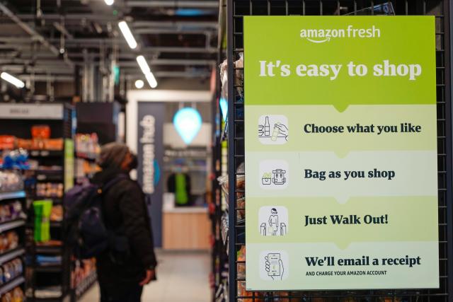 Customers shop for groceries inside Amazon Fresh store in Ealing, west London, the company's first no-checkout store in the UK which opened on Thursday. Photo: Niklas Halle'n/AFP via Getty