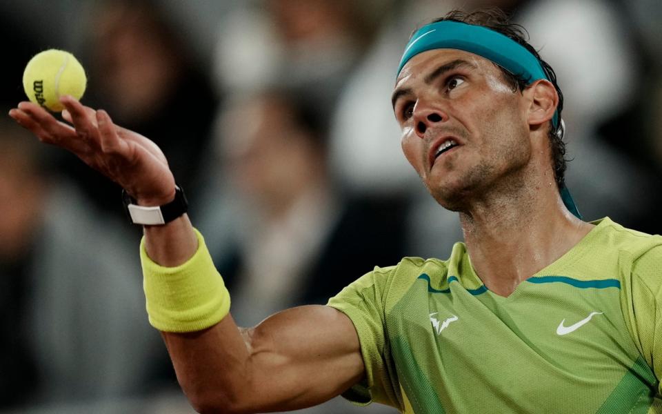 Spain's Rafael Nadal serves to Serbia's Novak Djokovic during their quarterfinal match of the French Open tennis tournament at the Roland Garros - AP Photo/Thibault Camus