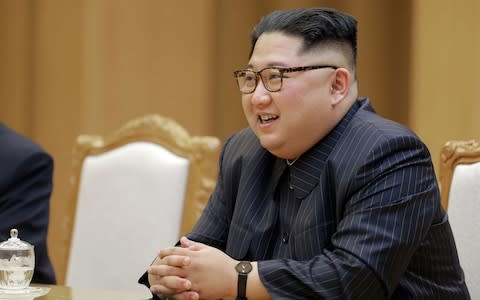 Mr Trump said Kim's recent rhetoric was to blame - Credit: AFP