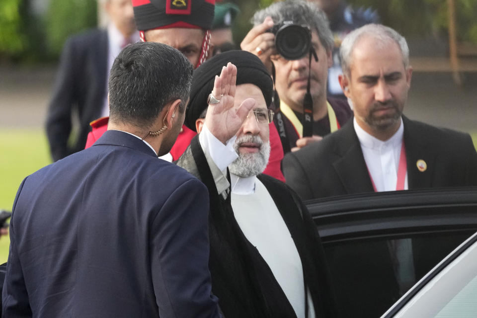 Iranian President Ebrahim Raisi, waves to the media after disembarking from a plane in Colombo, Sri Lanka, Wednesday, April 24, 2024. Raisi is the first Iranian leader to visit Sri Lanka since former President Mahmoud Ahmedinejad visited the country in 2008. (AP Photo/Eranga Jayawardena)