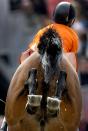 Gerco Schroder of The Netherlands riding London clears a tall jump during the team jumping event at the London 2012 Olympic Games Equestrian Jumping competition in Greenwich Park, south east London Britain, 06 August 2012. EPA/Olaf Kraak