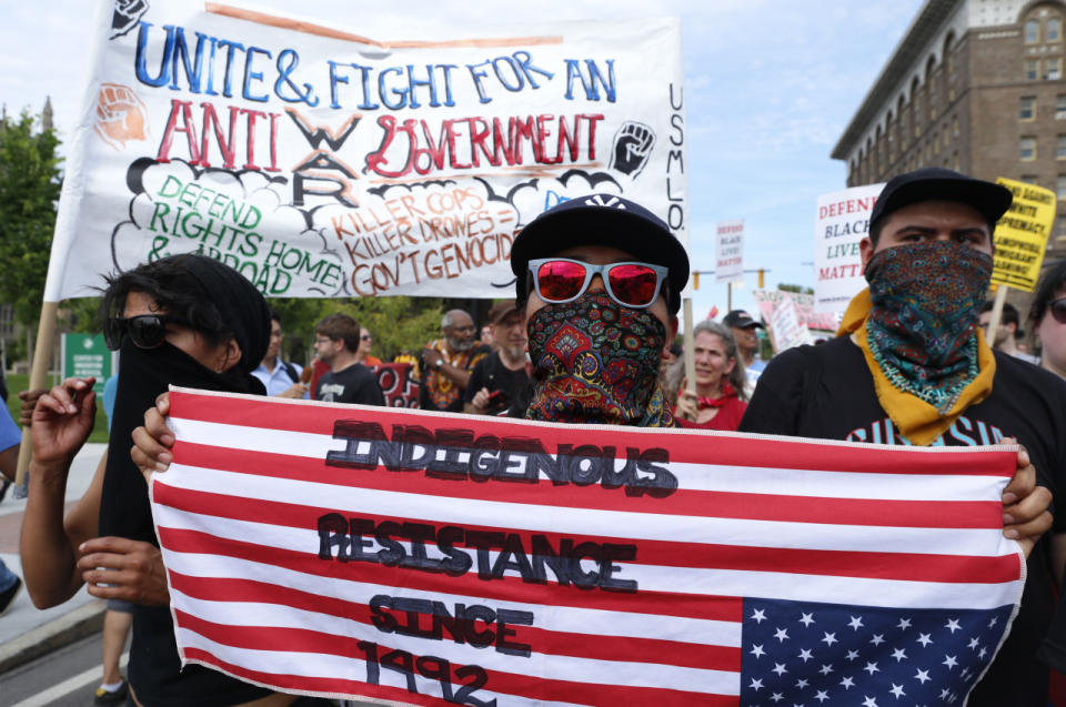 Demonstrators protest outside the RNC