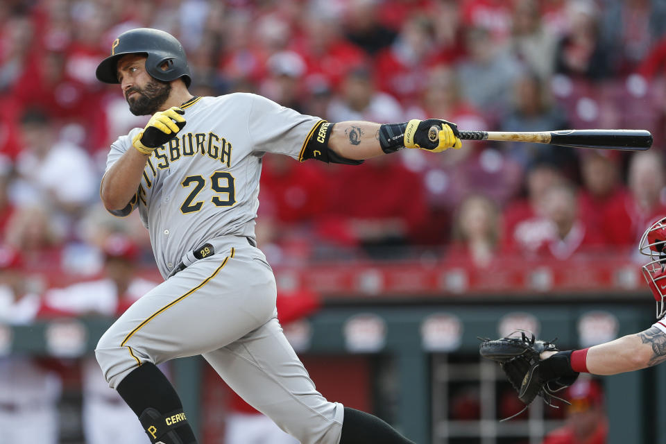 FILE - In this March 28, 2019, file photo, Pittsburgh Pirates' Francisco Cervelli hits a single off Cincinnati Reds relief pitcher Jared Hughes in the sixth inning of a baseball game in Cincinnati. The Pirates are parting ways with veteran catcher Francisco Cervelli, who has been hampered by multiple concussions this season. The club announced Thursday, Aug. 22, 2019, it requested unconditional release waivers for the 33-year-old Cervelli. (AP Photo/Gary Landers)