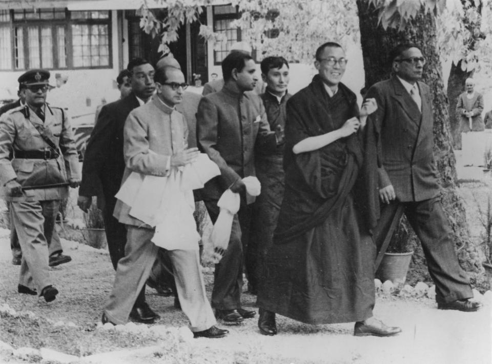 Tenzin Gyatso arrives in Mussoorie, India, after fleeing from Tibet.