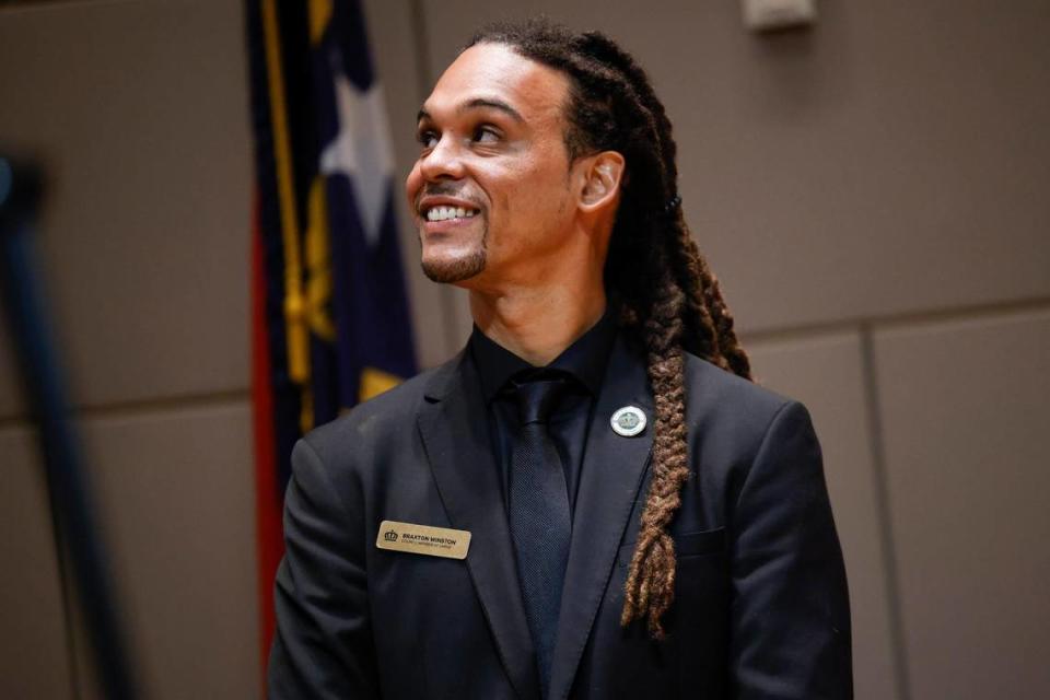 At-Large Charlotte City Council Member Braxton Winston glances to the crowd before taking his oath at the Charlotte-Mecklenburg Government Center in Charlotte, N.C., Tuesday, Sept. 6, 2022. Winston was selected as the new Charlotte mayor pro tem. Alex Slitz/alslitz@charlotteobserver.com