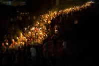 <p>Neo-Nazis, Alt-Right, and White Supremacists march through the University of Virginia Campus with torches in Charlottesville, Va., on Aug. 11, 2017. (Photo: Samuel Corum/Anadolu Agency/Getty Images) </p>