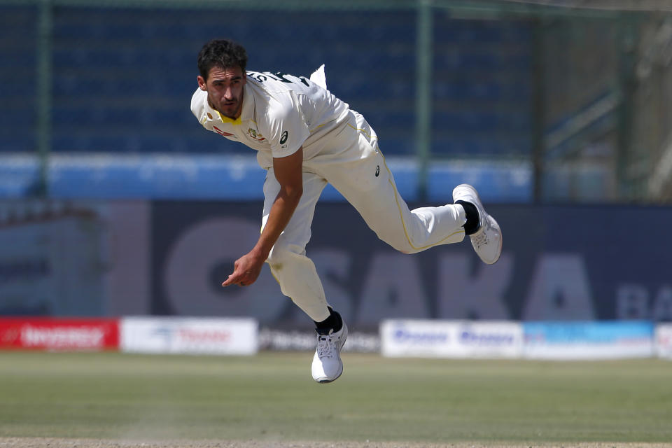 Australia's Mitchell Starc bowls on the third day of the second test match between Pakistan and Australia at the National Stadium in Karachi, Pakistan, Monday, March 14, 2022. (AP Photo/Anjum Naveed)