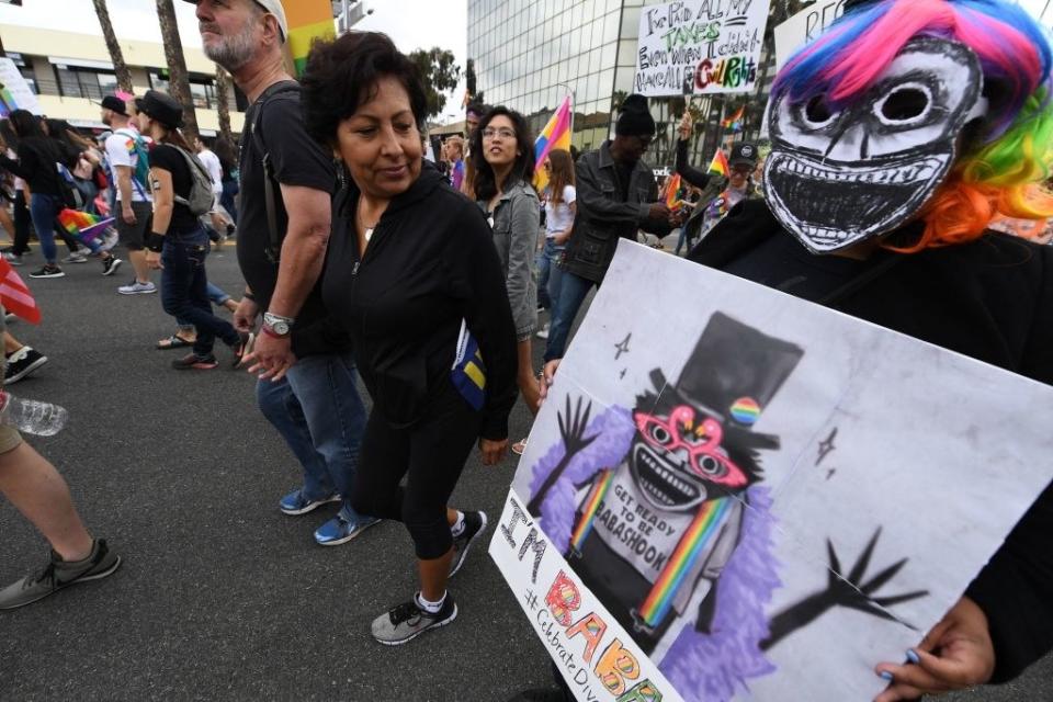 a babadook sign at a pride parade