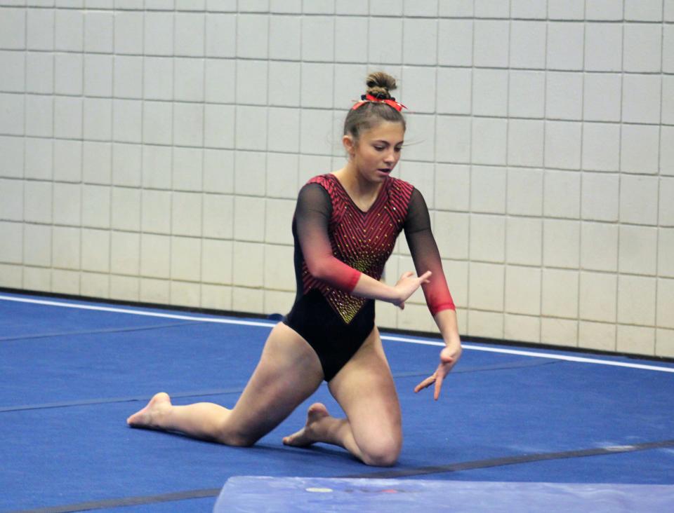 Big Walnut’s Kylie Clark competes on the floor exercise during a quad meet Thursday at Worthington Kilbourne.