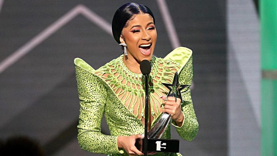 The rapper rocked multiple outfits as she performed alongside Offset and took home the award for Best Album.