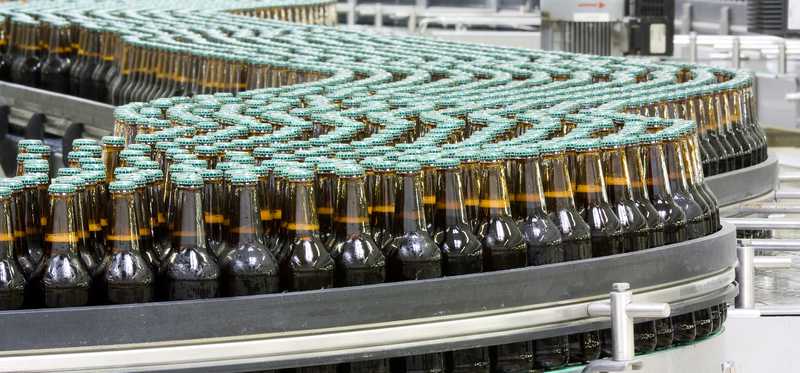 Bottled beverages on a conveyor belt.