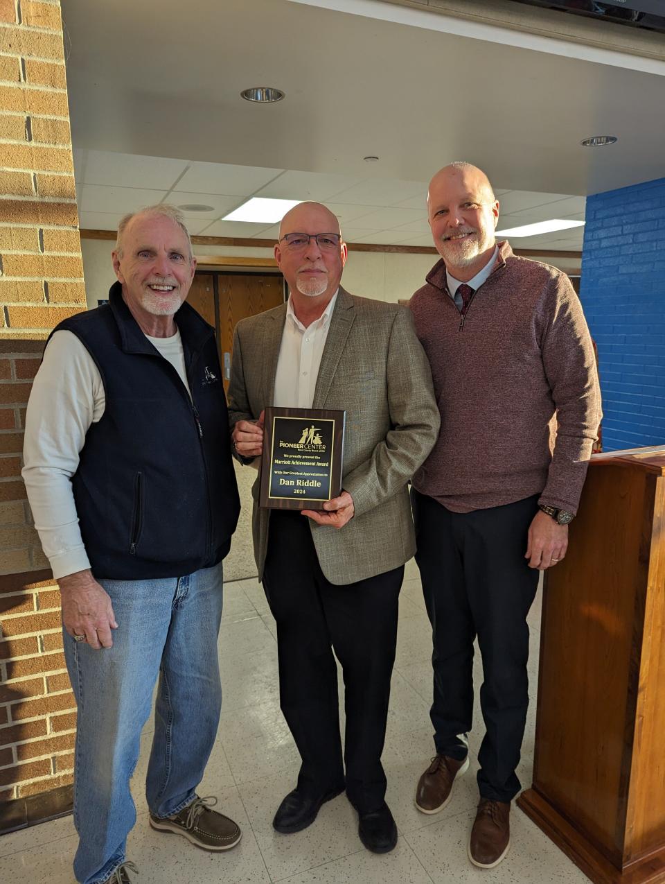 Marriott Achievement Award Winner, Dan Riddle, poses with presenters Rick Marriott and Craig Kerns.