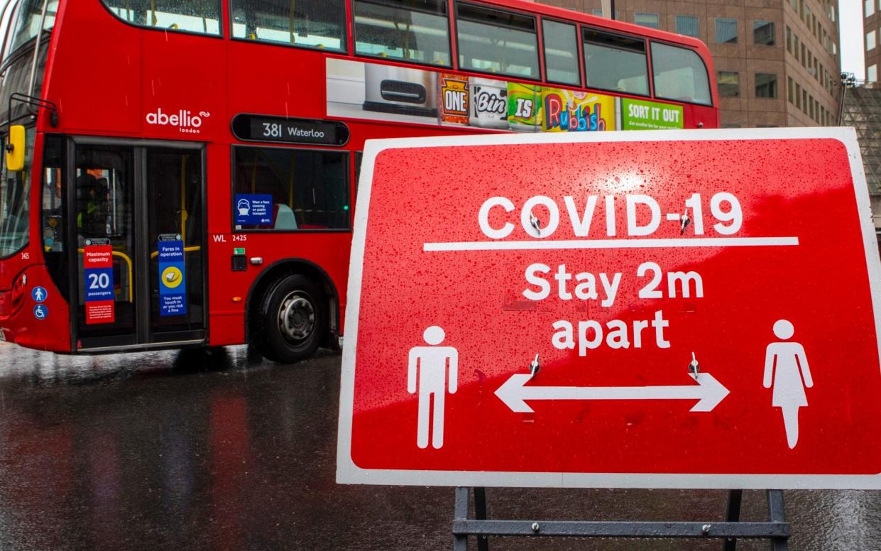 London, UK - June 17th 2020: A sign in central London reminding people follow the social distancing guidelines and stay 2 metres apart from others. - Getty Images