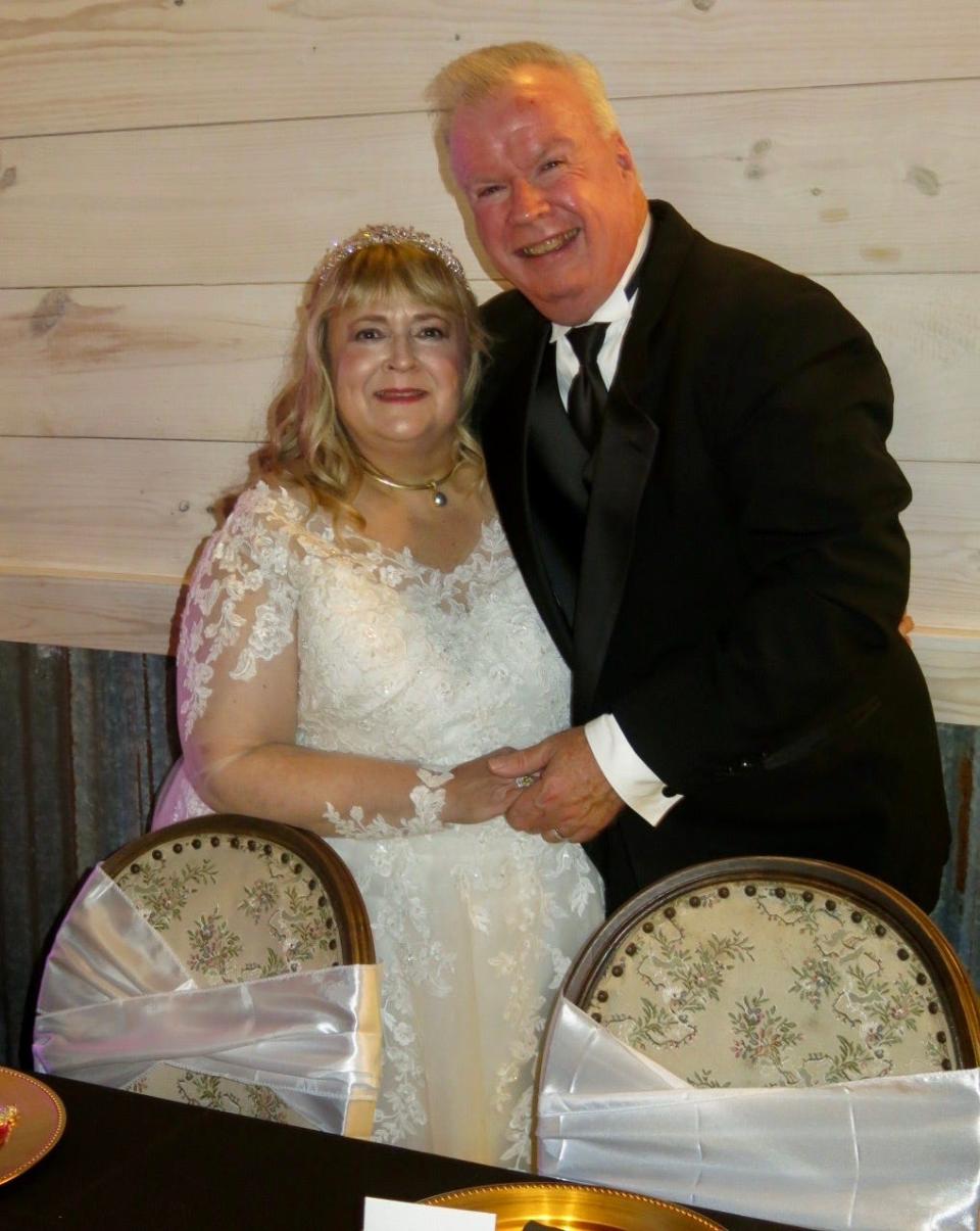 Barzanna White-Brown and husband Randy Brown celebrate their wedding with family and friends at a Bossier City reception in July 2023.