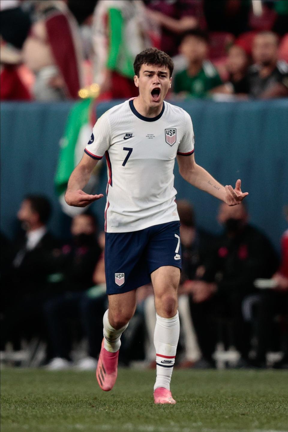 Gio Reyna celebrates after scoring a goal in the USMNT's win over Mexico in the 2021 Concacaf Nations League final at Empower Field at Mile High.