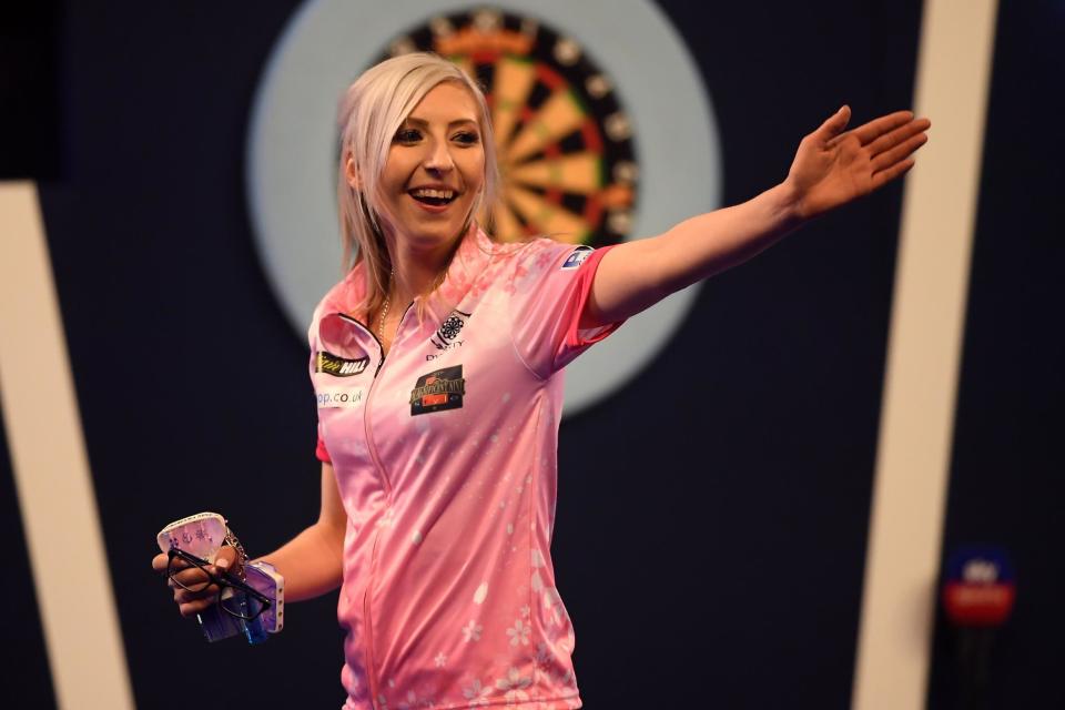 History maker | Fallon Sherrock reacts after winning her 1st round game against Ted Evetts: Alex Davidson/Getty Images