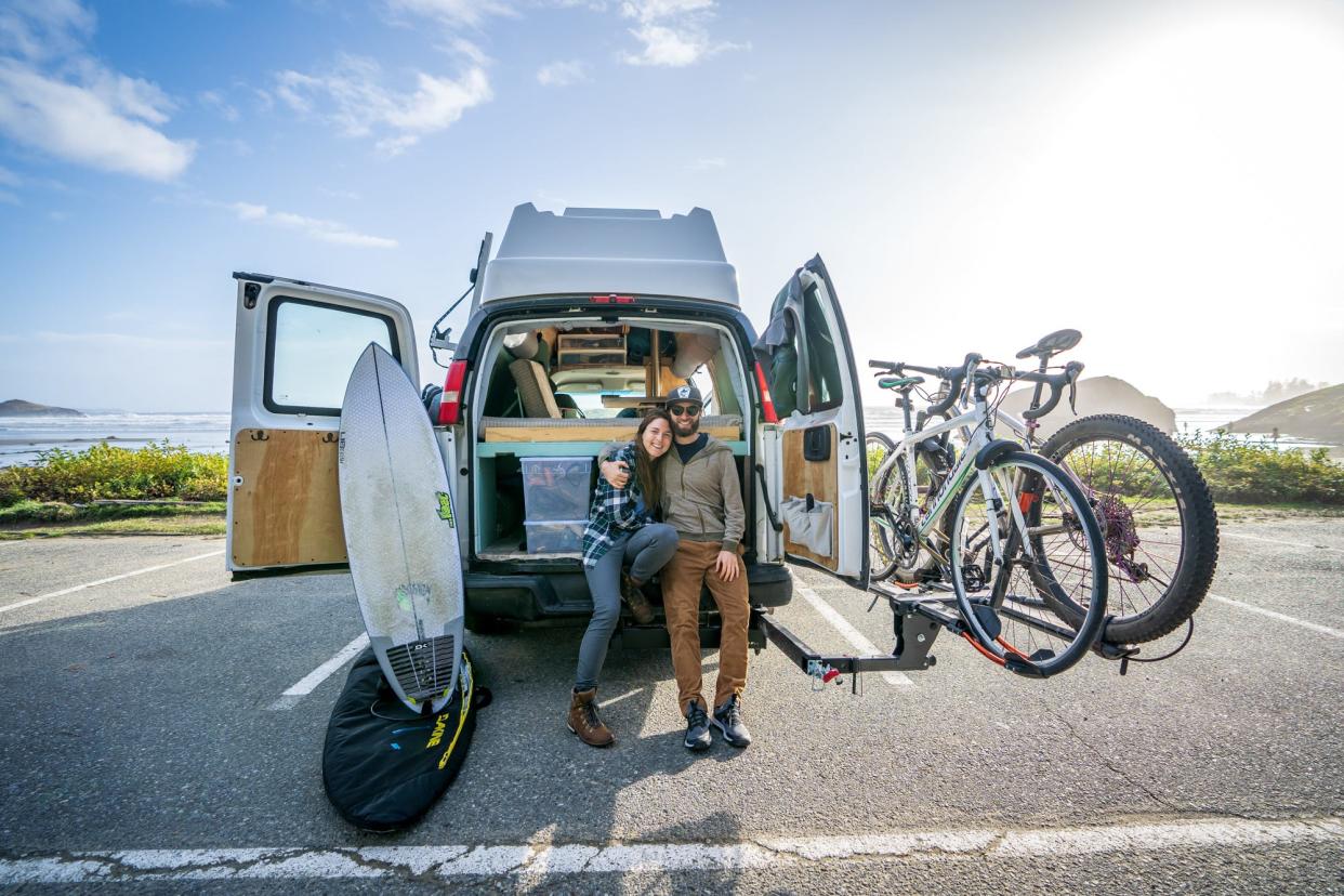 Katie and her partner Drew in their van in Canada