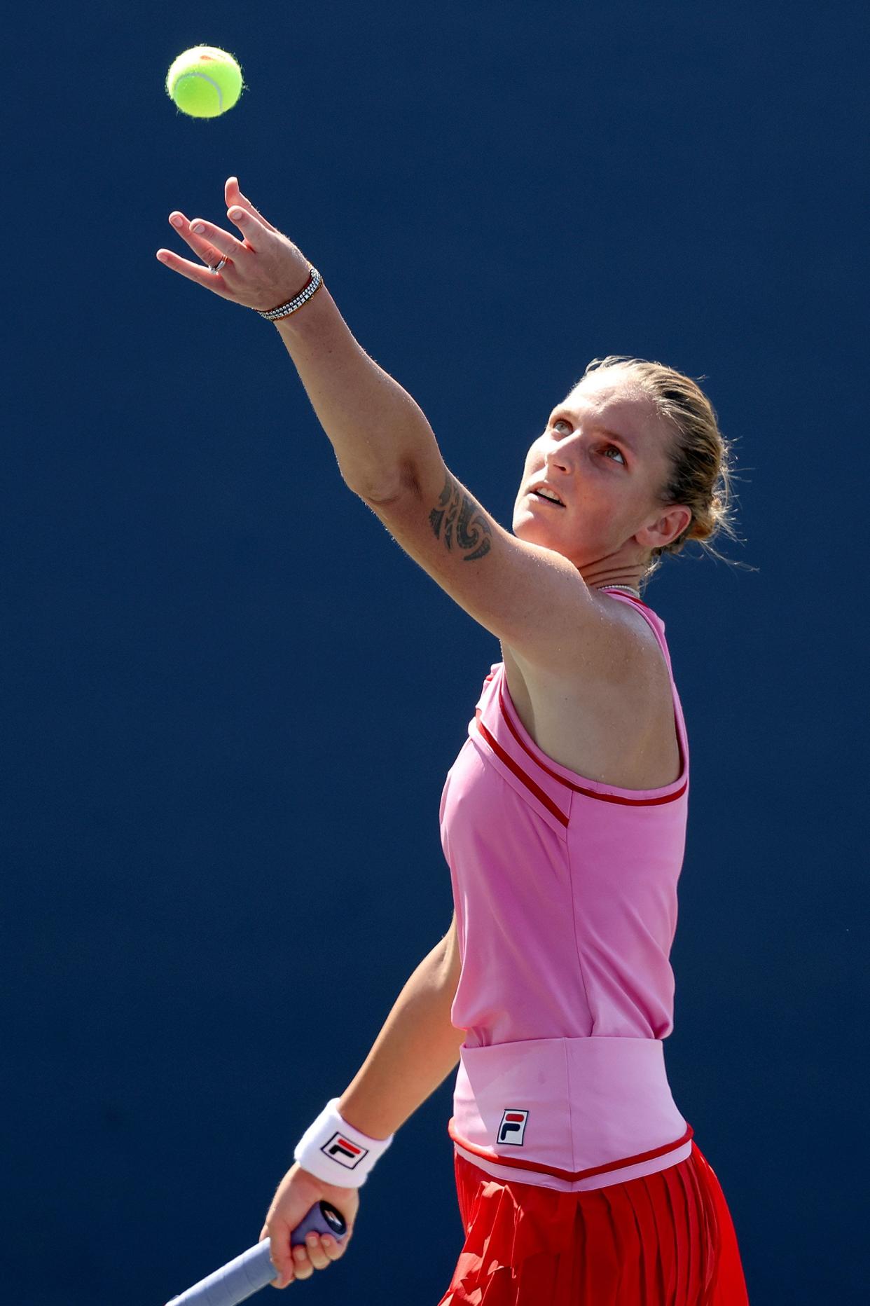 Karolina Pliskova of Czech Republic serves against Magda Linette of Poland in their Women's Singles First Round match on Day Two of the 2022 U.S. Open at USTA Billie Jean King National Tennis Center on Aug. 30, 2022, in Flushing, Queens.
