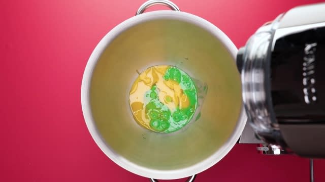 Egg yolk mixture for Chendol log cake in mixing bowl