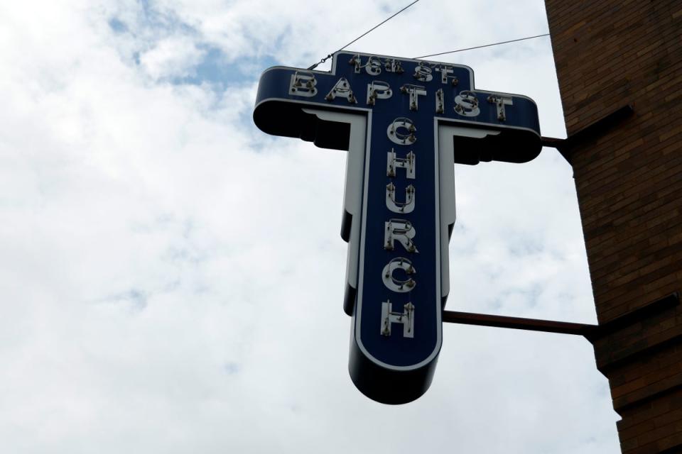 A sign outside Birmingham’s 16th Street Baptist Church on 15 September as a congregation hears from US Supreme Court Justice Ketanji Brown Jackson, among other US officials, to commemorate the 60th anniversary of a KKK bombing that killed four Black children. (AP)