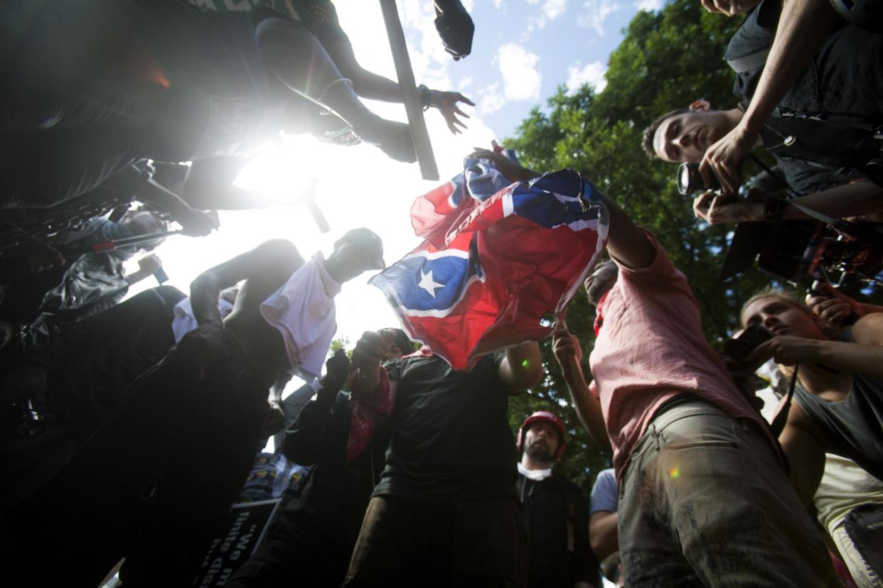 White supremacists and protesters clashed in Charlottesville over the weekend: AP