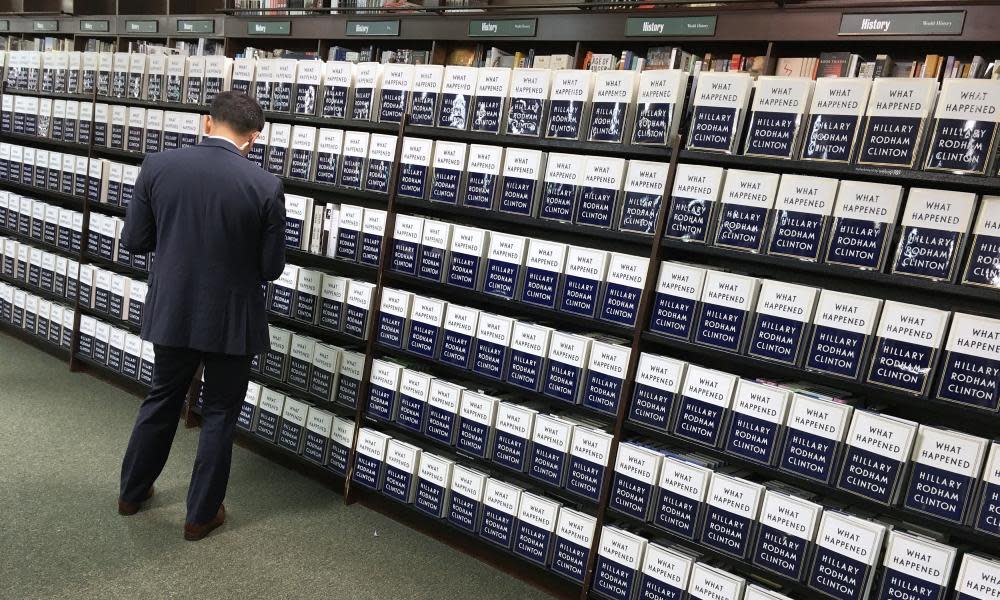 Copies of Hilary Clinton’s new book What Happened line shelves before she arrives for a book signing in Barnes & Noble.