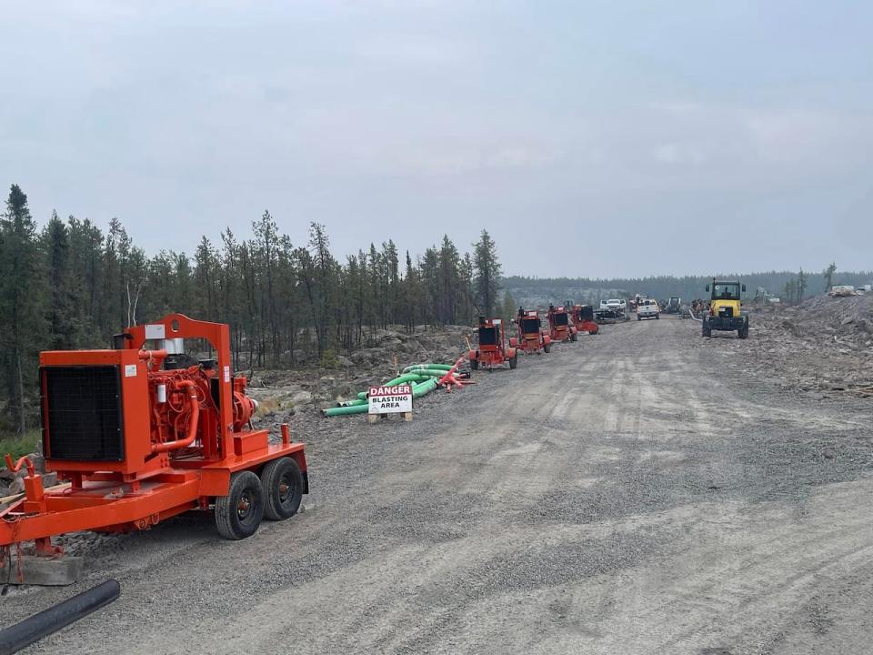 Water pumps ready to be deployed near Yellowknife as wildfire approaches the city, August 2023.