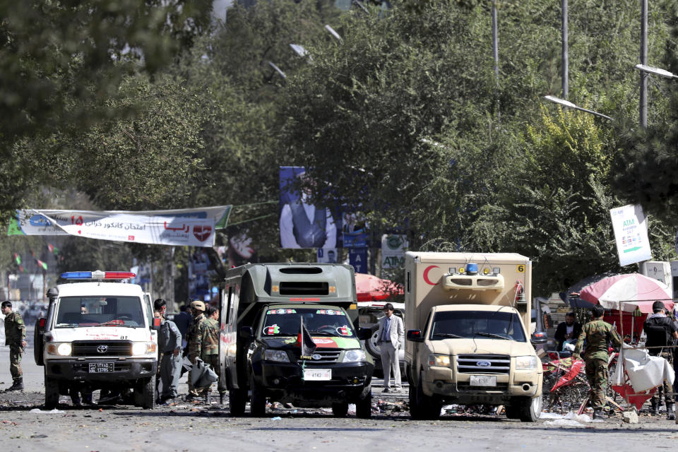 Ambulances are parked at the site of a suicide attack near the U.S. Embassy in Kabul, Afghanistan, Tuesday, Sept. 17, 2019. Hours earlier Afghan officials said a suicide bomber rammed his motorcycle packed with explosives into the entrance to a campaign rally of President Ashraf Ghani in northern Parwan province, killing over 20 people and wounding over 30. Ghani was present at the venue but was unharmed. The Taliban have claimed both attacks. (AP Photo/Ebrahim Noroozi)